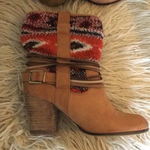Tribal accent leather ankle bootie